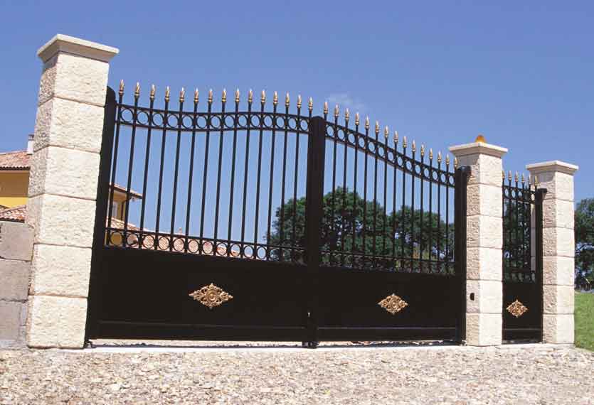 Tradition wrought iron gate with gold tops