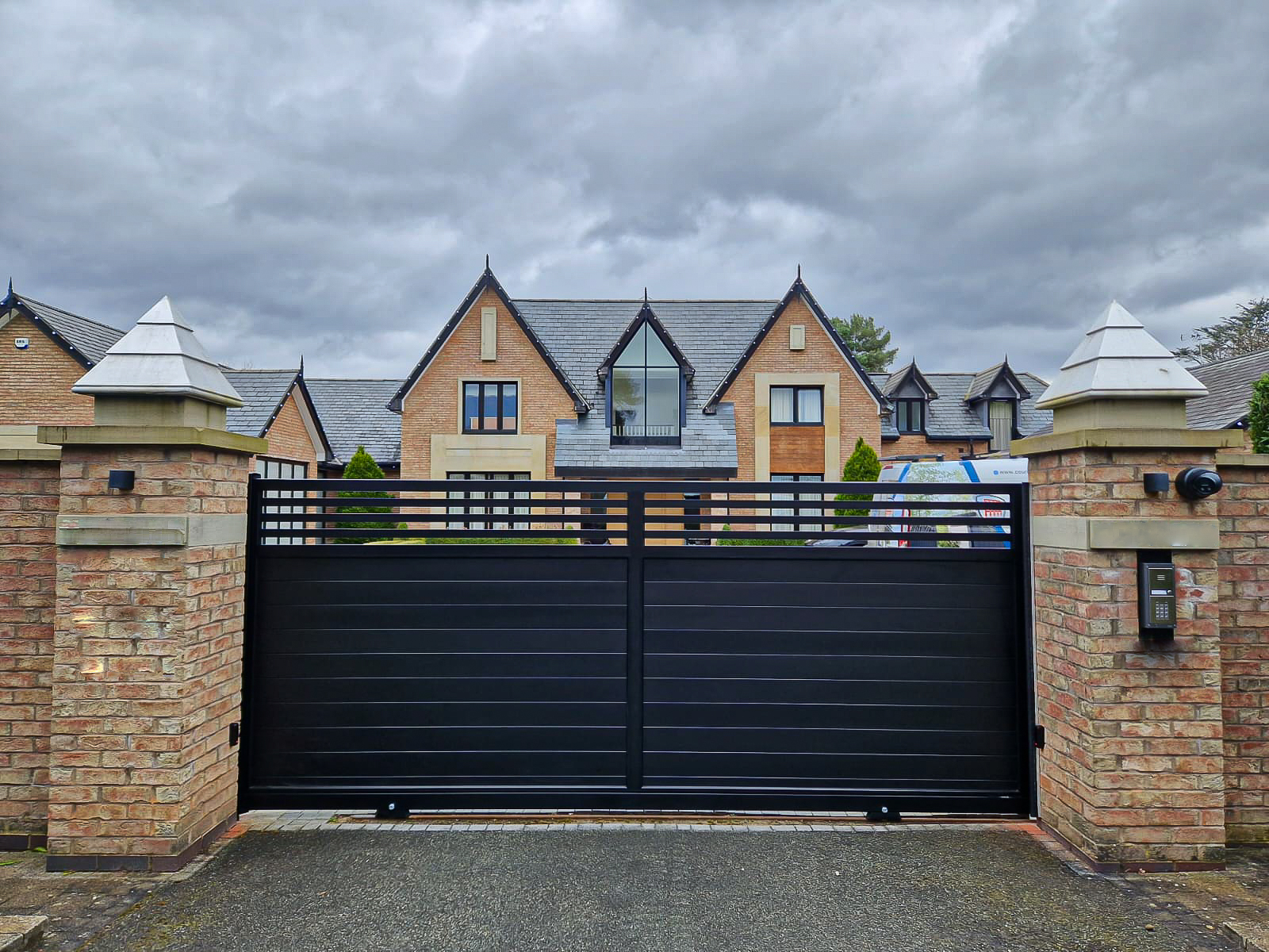 Aluminium Sliding Gate Fitted Between Lightly Coloured Bricks